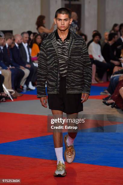 Model walks the runway at the Roberto Cavalli show during the 94th Pitti Immagine Uomo on June 13, 2018 in Florence, Italy.