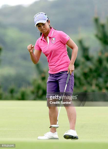 Ai Miyazato reacts after holing the birdie putt on the 15th green during the round two of the 23rd Daikin Orchid Ladies Golf Tournament at Ryukyu...