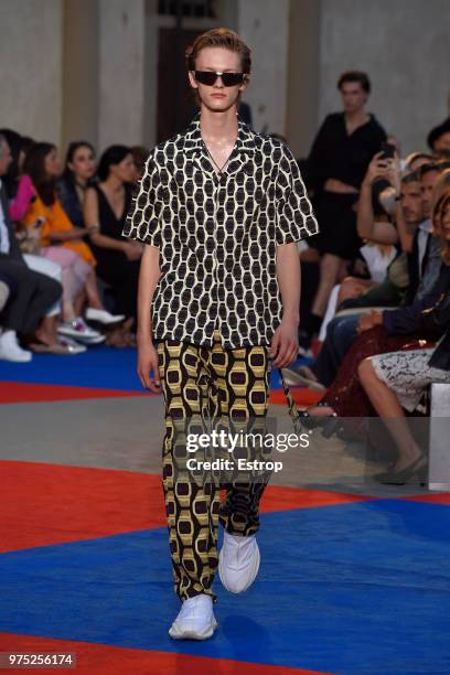 Model walks the runway at the Roberto Cavalli show during the 94th Pitti Immagine Uomo on June 13, 2018 in Florence, Italy.