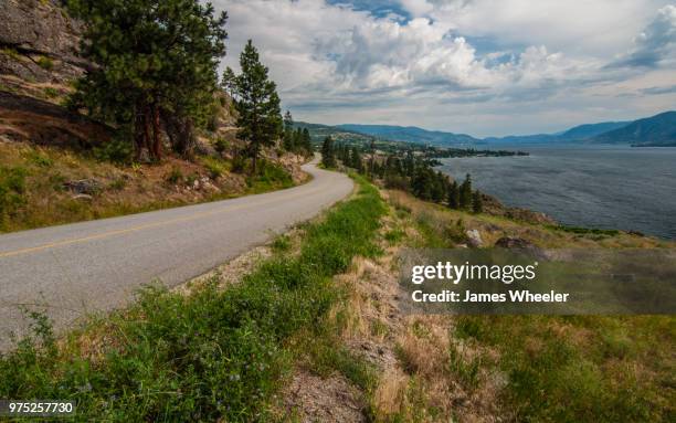 road to naramata - wheeler fields stock pictures, royalty-free photos & images