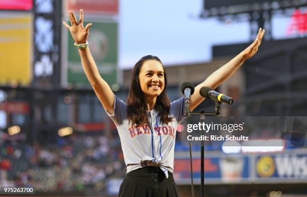 Tony Award winning actress Lena Hall performs the national anthem before a game between the New York Yankees and New York Mets at Citi Field on June...