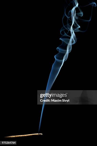 studio shot of burning cigar with smoke - incense stock pictures, royalty-free photos & images