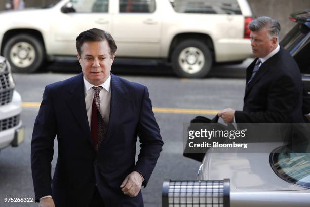 Paul Manafort, former campaign manager for Donald Trump, left, arrives at federal court in Washington, D.C., U.S., on Friday, June 15, 2018....