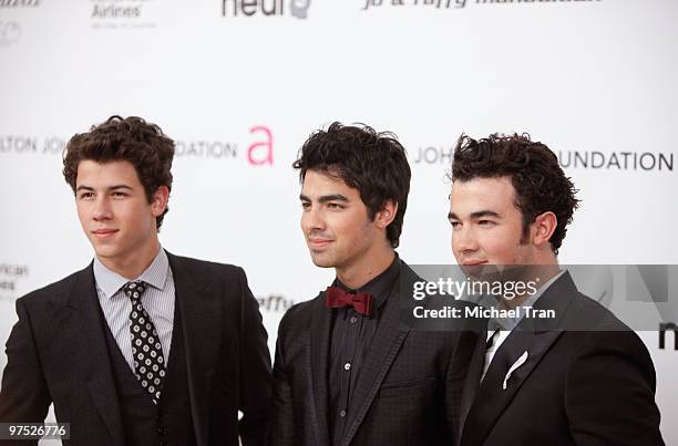 Nick Jonas, Joe Jonas and Kevin Jonas of the Jonas Brothers arrive to the 18th Annual Elton John AIDS Foundation Academy Awards Viewing Party held at...