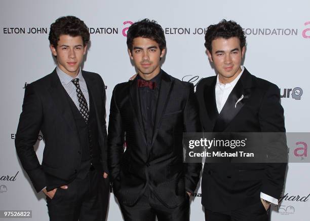 Nick Jonas, Joe Jonas and Kevin Jonas of the Jonas Brothers arrive to the 18th Annual Elton John AIDS Foundation Academy Awards Viewing Party held at...