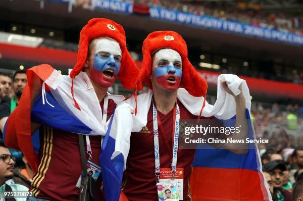 Fans cheer during the Opening Ceremony during the 2018 FIFA World Cup Russia group A match between Russia and Saudi Arabia at Luzhniki Stadium on...