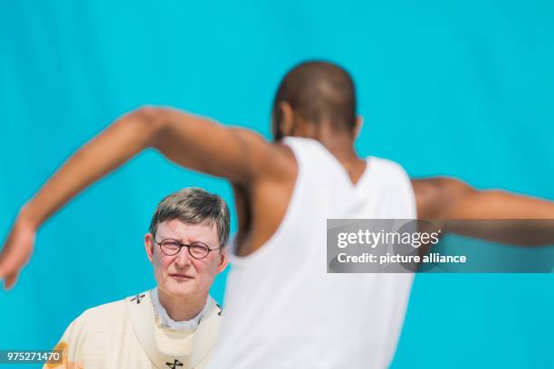 Dpatop - 13 May 2018, Germany, Muenster: Cardinal Rainer Maria Woelki , Archbishop of Cologne, watches a dancer at a service at the Palace. From 09...