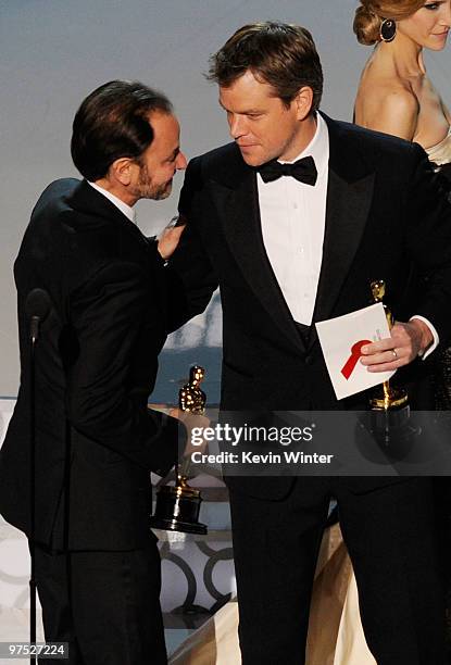 Producer Fisher Stevens accepts Best Documentary Feature award for "The Cove" from presenter Matt Damon onstage during the 82nd Annual Academy Awards...