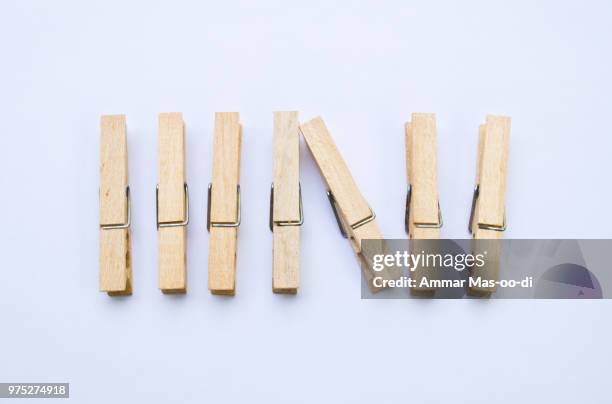 wooden clothes clips isolated on white back ground - tuning peg stock pictures, royalty-free photos & images