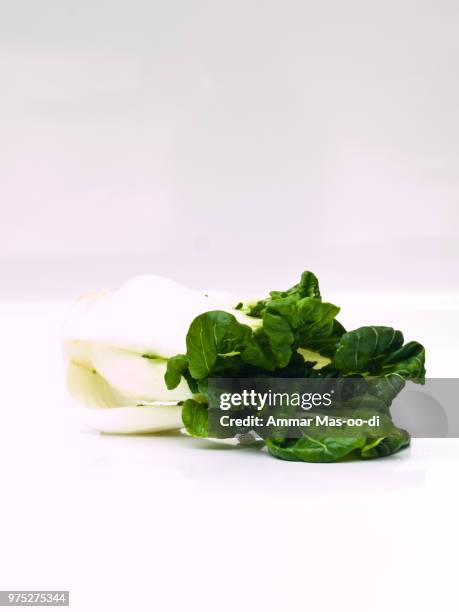 fresh baby bok choy, brassica rapa chinensis,  isolated on white - bok choy stockfoto's en -beelden