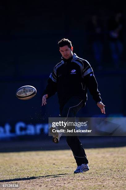 Saracens team coach Andy Farrell kicks a ball on the pitch before the game during the Guinness Premiership match between Leeds Carnegie and Saracens...