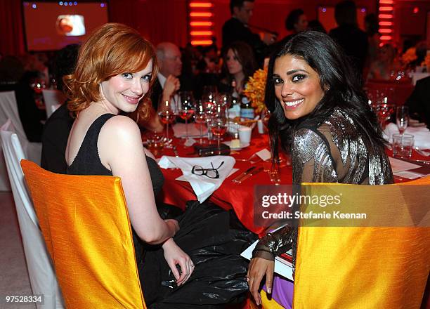 Actress Christina Hendricks, wearing Chopard, and Rachel Roy, attend the 18th Annual Elton John AIDS Foundation Oscar Party at Pacific Design Center...
