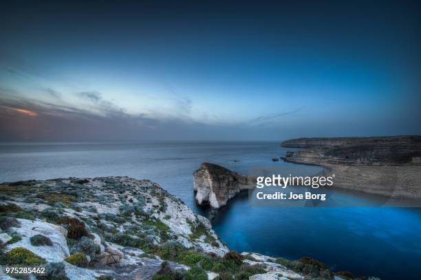 a costal landscape at dusk. - costal stock pictures, royalty-free photos & images