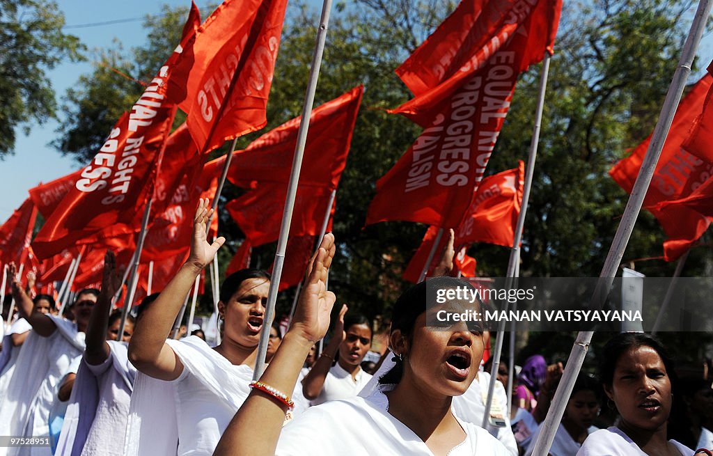 Indian activists shout shout slogans in
