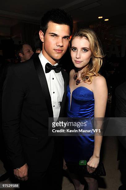 Taylor Lautner and Emma Roberts attends the 2010 Vanity Fair Oscar Party hosted by Graydon Carter at the Sunset Tower Hotel on March 7, 2010 in West...