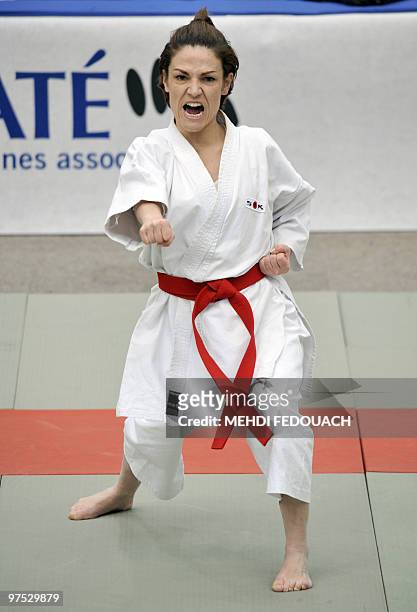 French deputy minister for Ecology and former Karate-kata French champion Chantal Jouanno competes in the French Karate team championships on March...