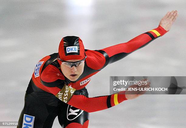 Germany's Jenny Wolf competes in the women's 500m Speed skating race of the ISU World Cup in the eastern German city of Erfurt on March 7, 2010. Wolf...