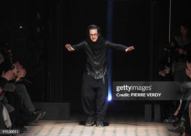 Croatian designer Damir Doma acknowledges the public after his autumn-winter 2010 pret-a-porter collection show on March 3, 2010 in Paris. AFP...