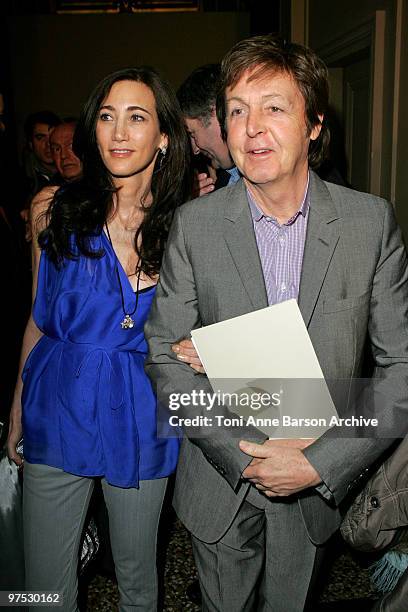 Sir Paul McCartney and Nancy Shevell attend the Stella McCartney Ready to Wear show as part of the Paris Womenswear Fashion Week Fall/Winter 2011 at...