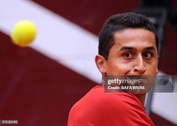 Spain's Nicolas Almagro eyes the ball during a Davis Cup tennis match against Switzerland's Marco Chiudinelli in Logrono, northern Spain, on March 7,...