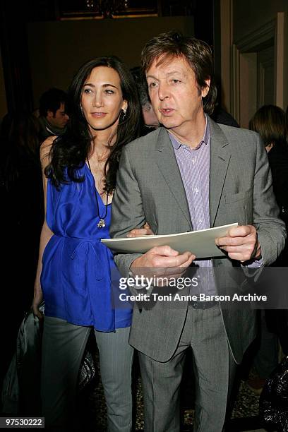 Sir Paul McCartney and Nancy Shevell attend the Stella McCartney Ready to Wear show as part of the Paris Womenswear Fashion Week Fall/Winter 2011 at...