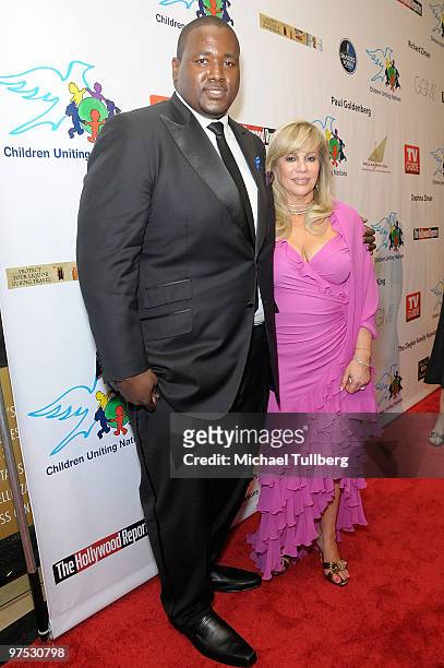 Actor Quinton Aaron and Children Uniting Nations founder Daphna Ziman arrive at the 11th Annual Children Uniting Nations Oscar Celebration, held at...