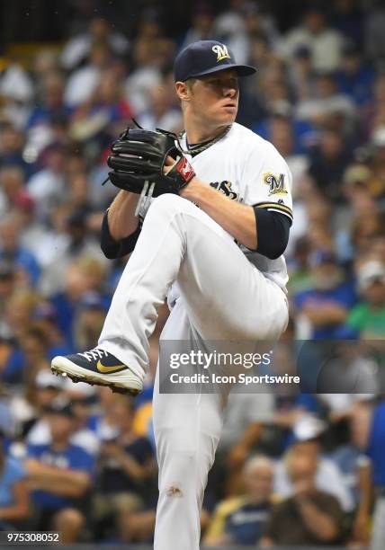 Milwaukee Brewers Starting pitcher Chase Anderson delivers a pitch during a MLB game between the Milwaukee Brewers and Chicago Cubs on June 12, 2018...