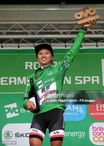 Overall race lead Coryn Rivera celebrates on the podium after winning stage three of the OVO Energy Women's Tour from Atherstone to Royal Leamington...