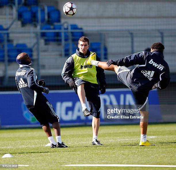 Gonzalo Higuain , Marcelo and Lassana Diarra of Real Madrid in action during a training session at Valdebebas on March 8, 2010 in Madrid, Spain.