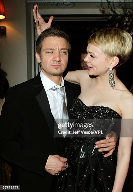 Actors Jeremy Renner and Carey Mulligan attend the 2010 Vanity Fair Oscar Party hosted by Graydon Carter at the Sunset Tower Hotel on March 7, 2010...
