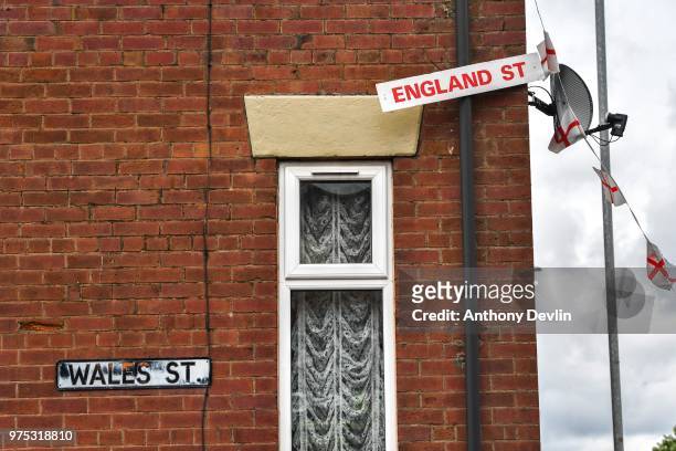Sign on Wales Street in Oldham which local residents have re-named England Street and decorated with flags to celebrate the FIFA World Cup Russia...