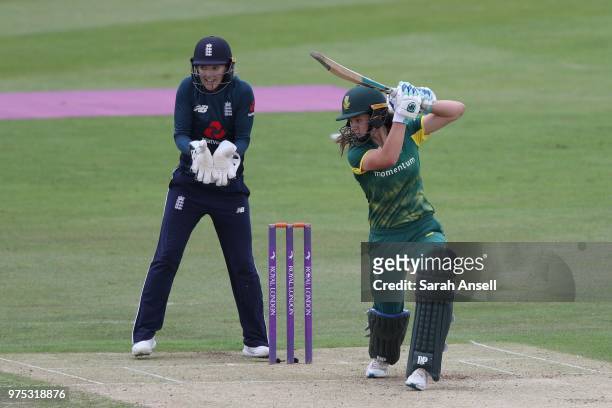Laura Wolvaardt of South Africa Women hits out as Sarah Taylor of England Women looks on during the 3rd ODI of the ICC Women's Championship between...