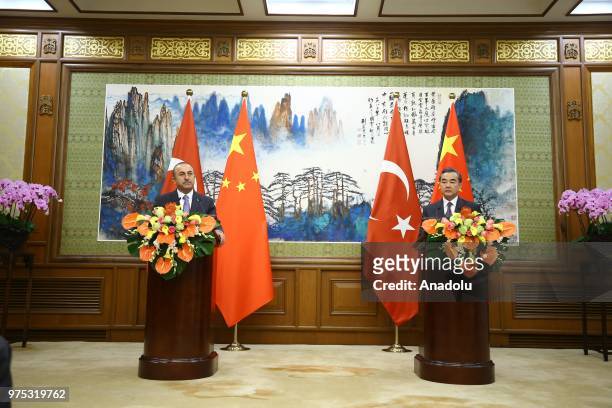 Turkish Foreign Affairs Minister Mevlut Cavusoglu and Chinese State Councilor and Foreign Minister Wang Yi hold a joint press conference after...