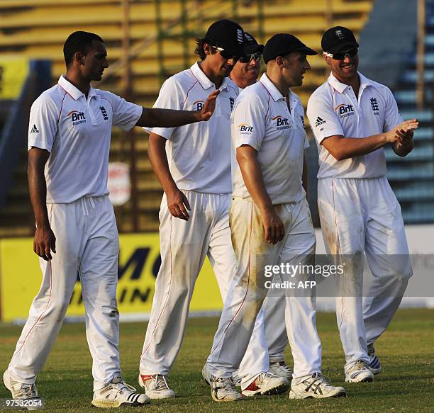 England cricket captain Alastair Cook leaves the field with teammates Ajmal Shahzad , Matt Prior , James Tredwell and Ian Bell after during the...