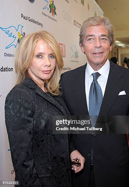 Actress Rosanna Arquette and guest arrive at the 11th Annual Children Uniting Nations Oscar Celebration, held at the Beverly Hilton Hotel on March 7,...