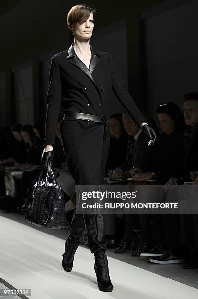 Model displays a creation as part of Bottega Veneta Fall-Winter 2010-2011 ready-to-wear collection on February 27, 2010 during the Women's fashion...