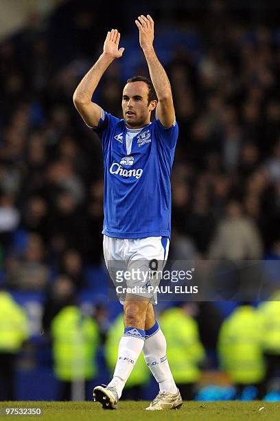 Everton's US forward Landon Donovan waves to the crowd after their English Premier League football match against Hull City at Goodison Park in...