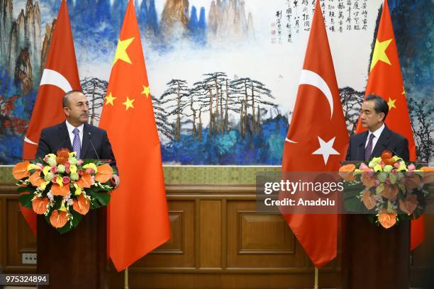 Turkish Foreign Affairs Minister Mevlut Cavusoglu and Chinese State Councilor and Foreign Minister Wang Yi hold a joint press conference after...