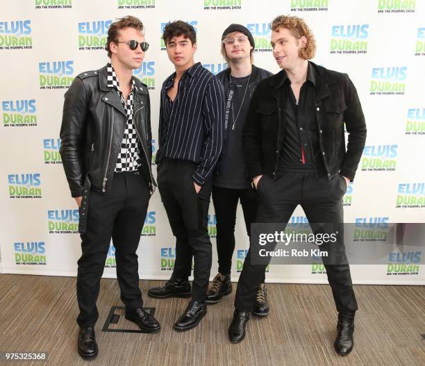 Ashton Irwin, Calum Hood, Michael Clifford and Luke Hemmings of 5 Seconds Of Summer visit "The Elvis Duran Z100 Morning Show" at Z100 Studio on June...