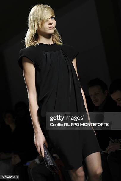 Model displays a creation as part of Bottega Veneta Fall-Winter 2010-2011 ready-to-wear collection on February 27, 2010 during the Women's fashion...