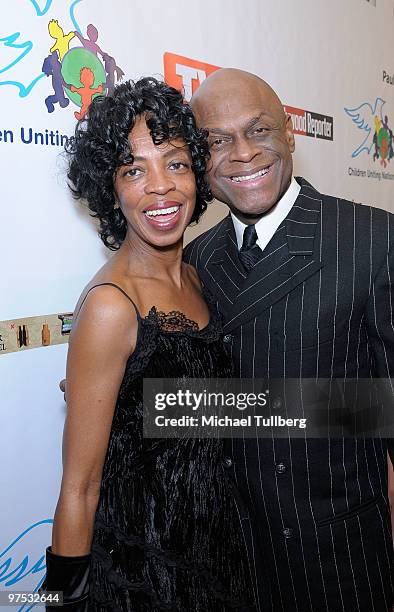 Comedian Michael Colyar arrives with wife Brooks Colyar at the 11th Annual Children Uniting Nations Oscar Celebration, held at the Beverly Hilton...