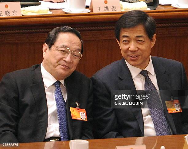 Bo Xilai , Communist Party of China Chongqing Committee Secretary talks with Yu Zhengsheng, Communist Party of China Shanghai Committee Secretary...
