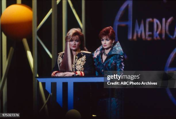 Los Angeles, CA Wynonna Judd, Naomi Judd, The Judds presenting on the 17th Annual American Music Awards, Shrine Auditorium, January 22, 1990.