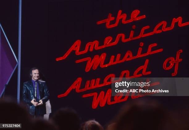 Los Angeles, CA Neil Diamond receiving Award of Merit on the 17th Annual American Music Awards, Shrine Auditorium, January 22, 1990.