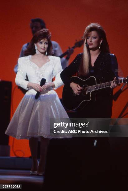 Los Angeles, CA Naomi Judd, Wynonna Judd, The Judds performing on the 17th Annual American Music Awards, Shrine Auditorium, January 22, 1990.