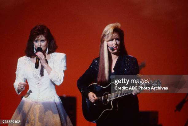 Los Angeles, CA Naomi Judd, Wynonna Judd, The Judds performing on the 17th Annual American Music Awards, Shrine Auditorium, January 22, 1990.