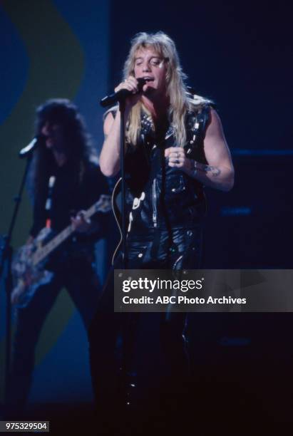 Los Angeles, CA Jani Lane of Warrant performing on the 17th Annual American Music Awards, Shrine Auditorium, January 22, 1990.