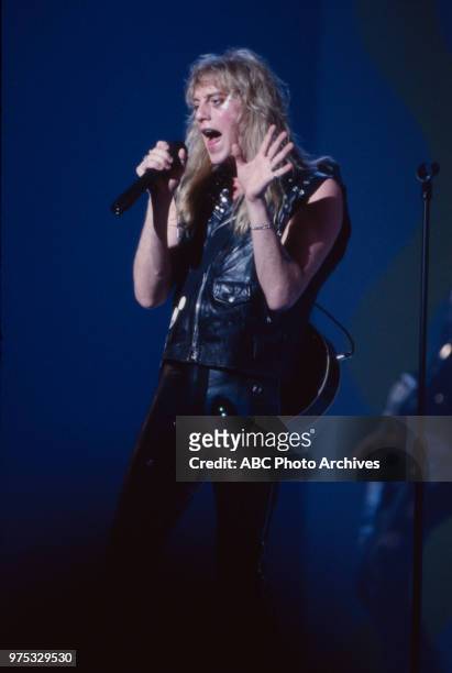 Los Angeles, CA Jani Lane of Warrant performing on the 17th Annual American Music Awards, Shrine Auditorium, January 22, 1990.