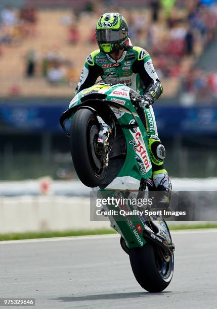 Cal Crutchlow of Great Britain and LCR Honda Castrol lifts the front wheel during free practice for the MotoGP of Catalunya at Circuit de Catalunya...