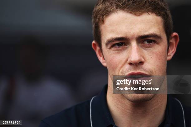 Paul Di Resta of Great Britain and the United Autosports team is interviewed by the media during previews to the Le Mans 24 Hour race at the Circuit...